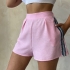 Розовые женские шорты с декоративными вставками