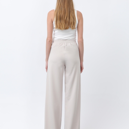 Женские бежевые брюки с боковыми полосами