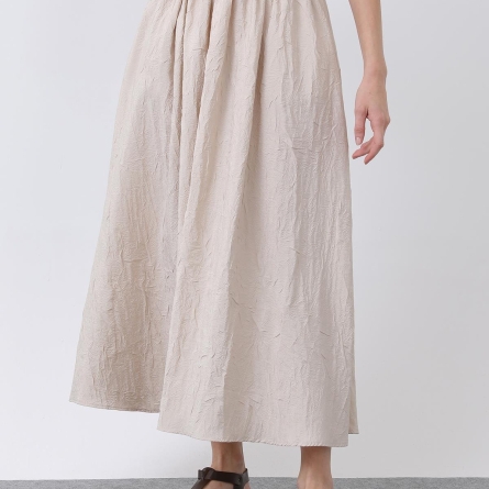 Fustă bej midi evazată cu talie elastică