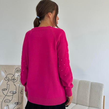 Fuchsia sweater with pearls and textured pattern
