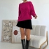 Fuchsia sweater with pearls and textured pattern