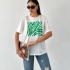 White T-shirt with Green Zebra Print